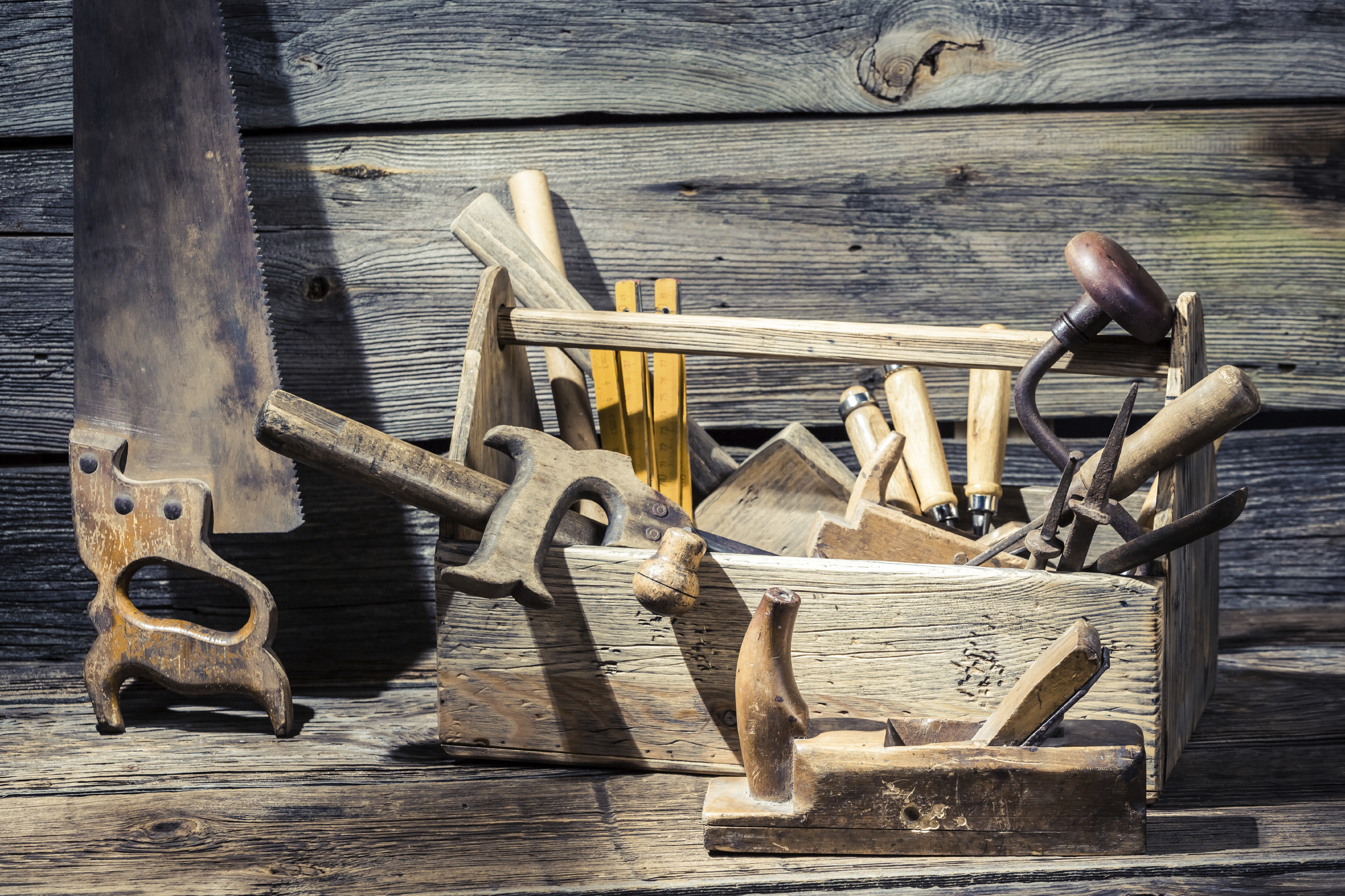 Vintage carpenter tools in a wooden box